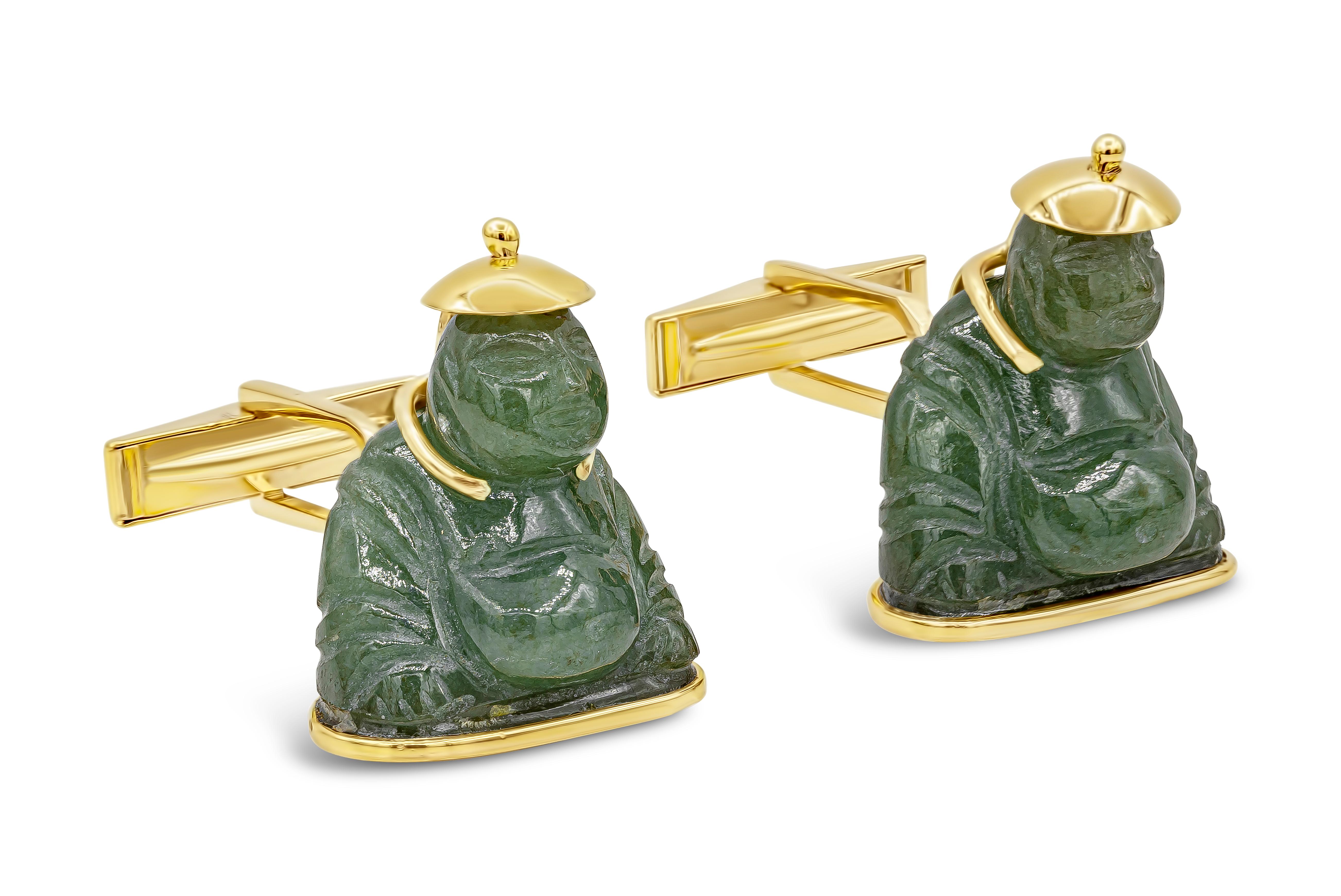 A unique pair of cufflinks showcasing an intricately-designed buddha made of Nephrite Jade. Set in a 14K Yellow Gold mounting with a whale back closure.

