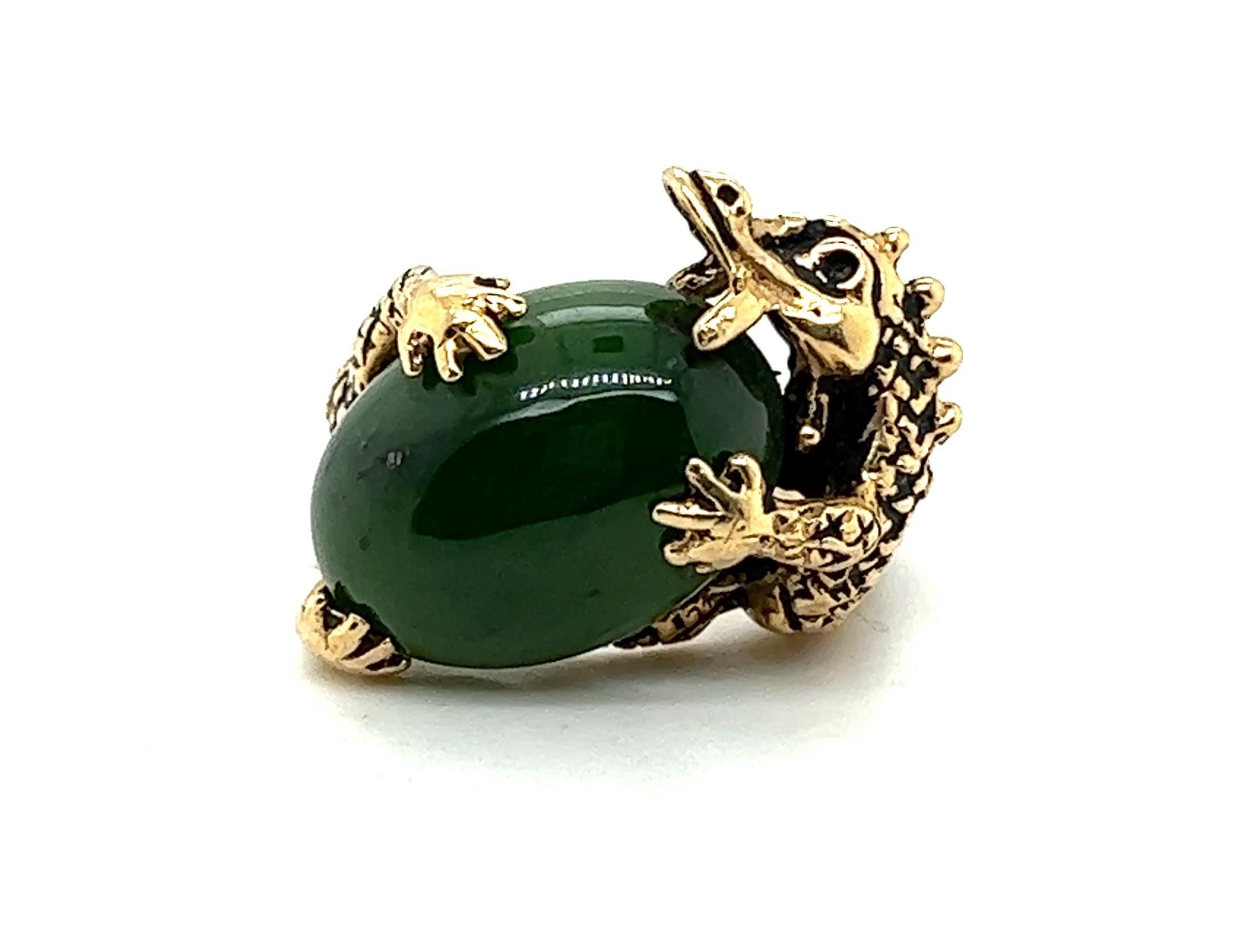 Seen as protectors of gold and jewels in European mythology, dragons were often depicted with stacks of gold and bags of precious gems. Now you can have your own pet dragon to guard your jewels as well as this lush 12.97ct deep moss green jade. His