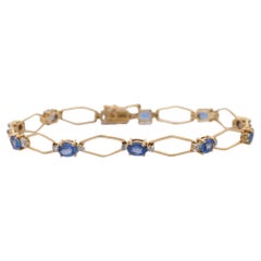Pulsera de oro amarillo de 14 quilates con diamantes y zafiro azul talla octágono