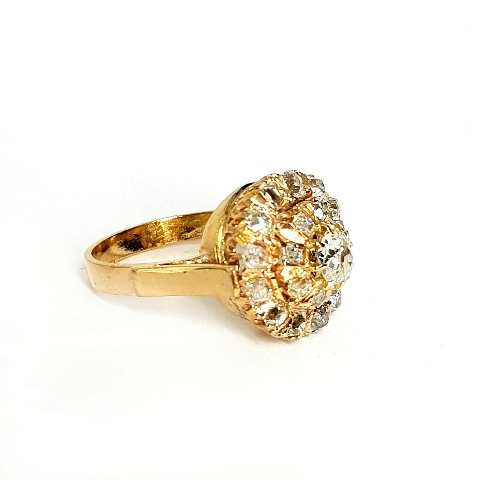  This is beautiful cluster ring features 22 pieces of old european cut diamonds in approximately 0.70 carat total weight, H color and SI2 stone clarity, crafted in 14k yellow gold. The ring is pre-owned and some of the prongs are worn, and one is