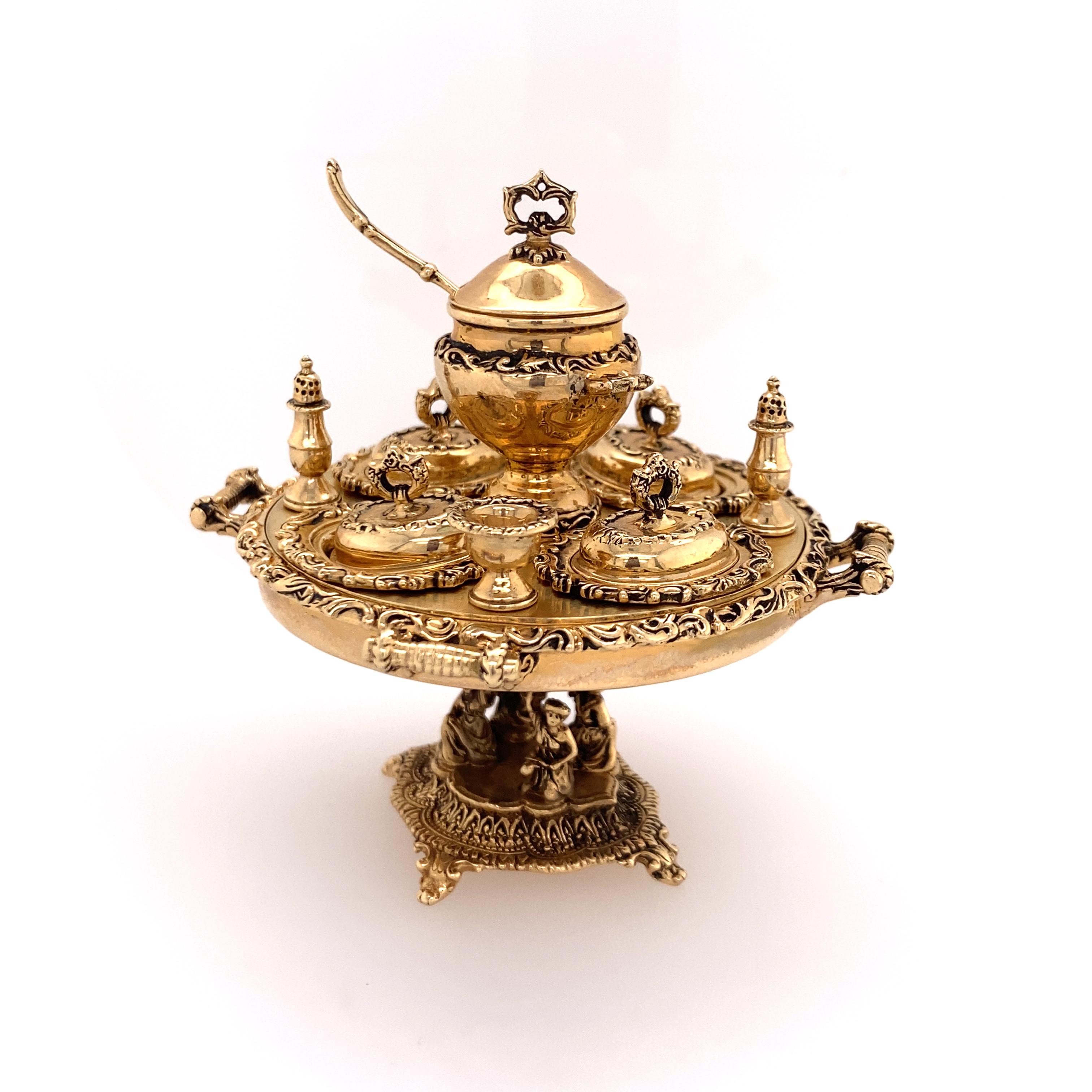 Museum quality Stephen van O'Meara 13 piece miniature English hunt breakfast set, consisting of 14K yellow gold round lazy susan with 4 handles and small pedestal base, 4 removable covered dishes, center lidded tureen and ladle, and 2 chalices and