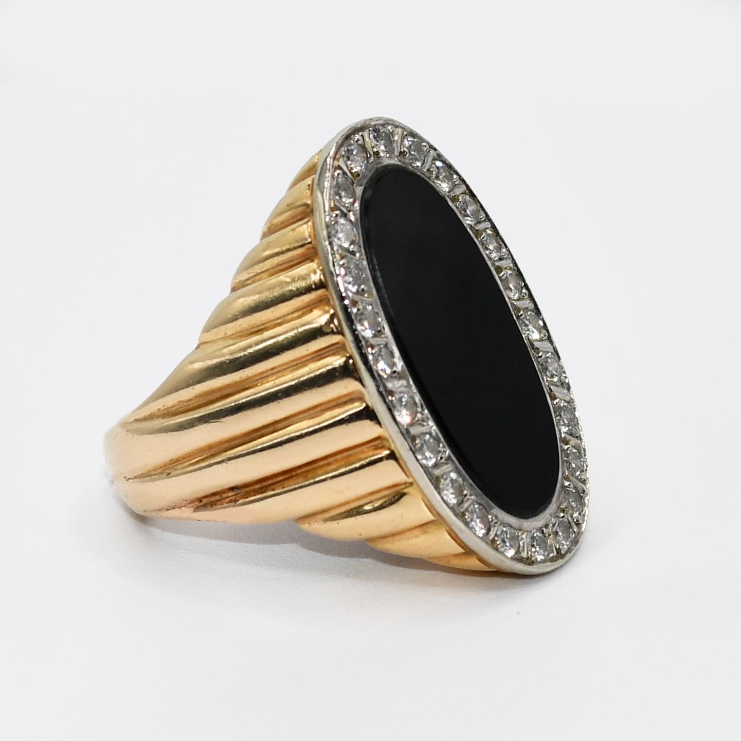 14K Yellow Gold Onyx Diamond Ring, .50tdw, 13.2g

Black onyx and diamond ring in 14k yellow gold setting.
Tests 14k to 16k with electronic tester and weighs 13.2 grams gross weight.
Oval black onyx with round brilliant cut diamonds.
The diamonds are