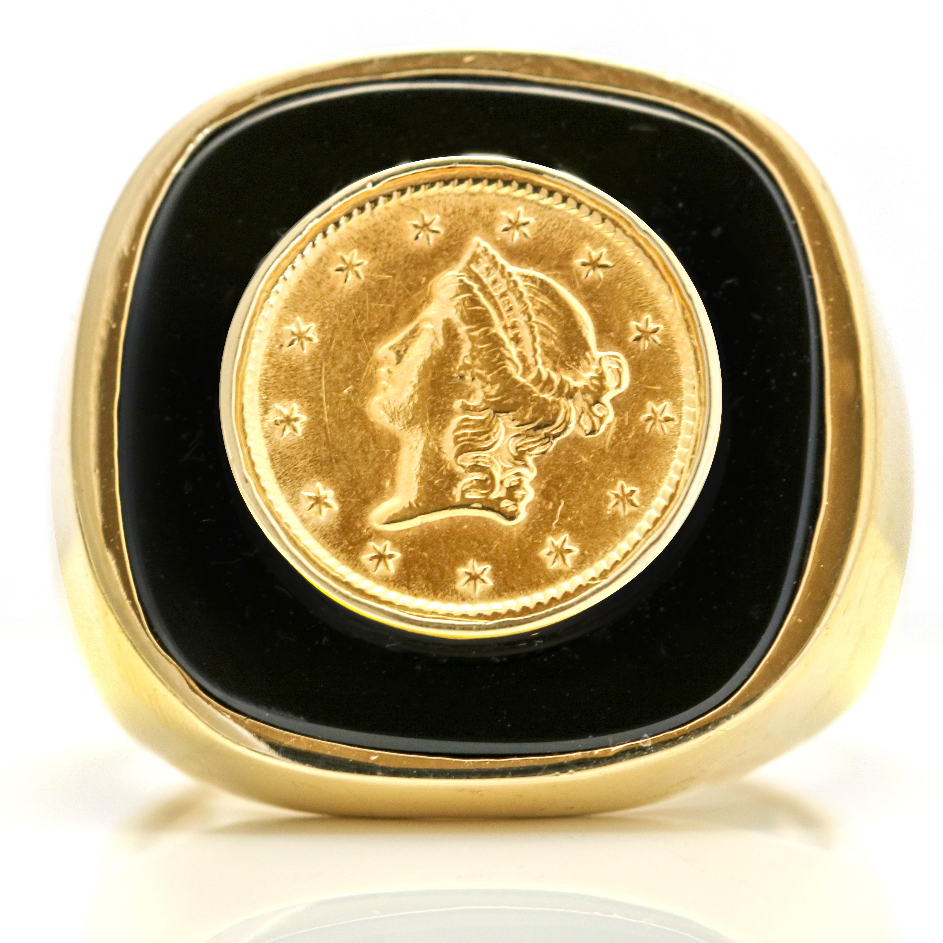 Men's 1 dollar coin signet ring in 14-karat yellow gold with black onyx inlay. 

Size, 9