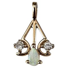 Pendentif en or jaune 14 carats, opale et diamants n° 25402