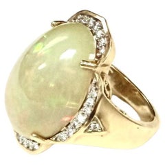 Anello in oro giallo 14K con opale e diamanti