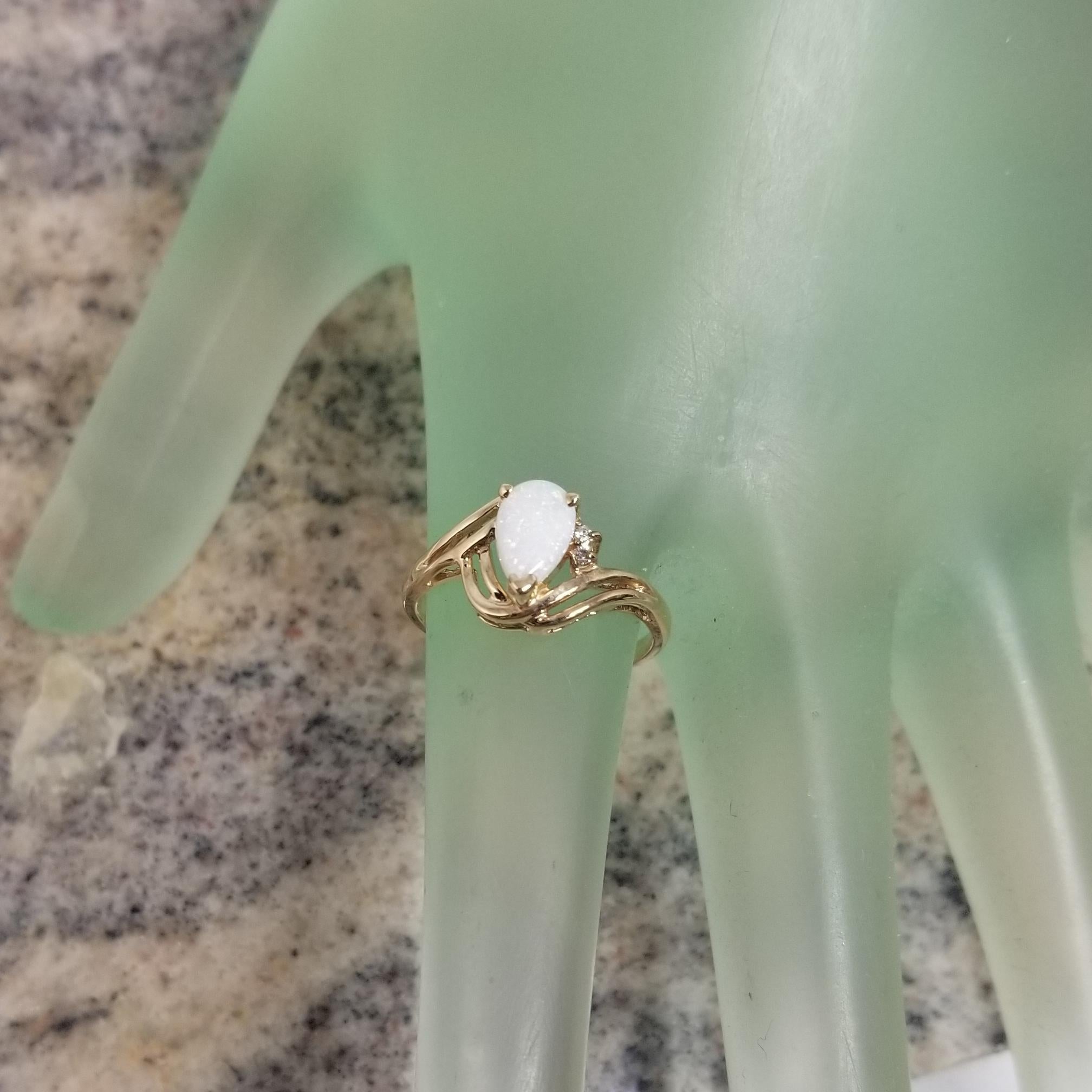 14 Karat Yellow Gold Opal and Diamond Ring In Excellent Condition For Sale In Los Angeles, CA