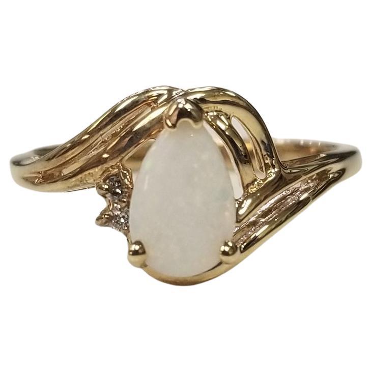 14 Karat Yellow Gold Opal and Diamond Ring For Sale
