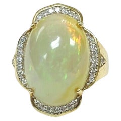 Bague en or jaune 14 carats, opale et diamant