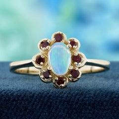 14K Yellow Gold Opal and Garnet Vintage Style Floral Halo Ring