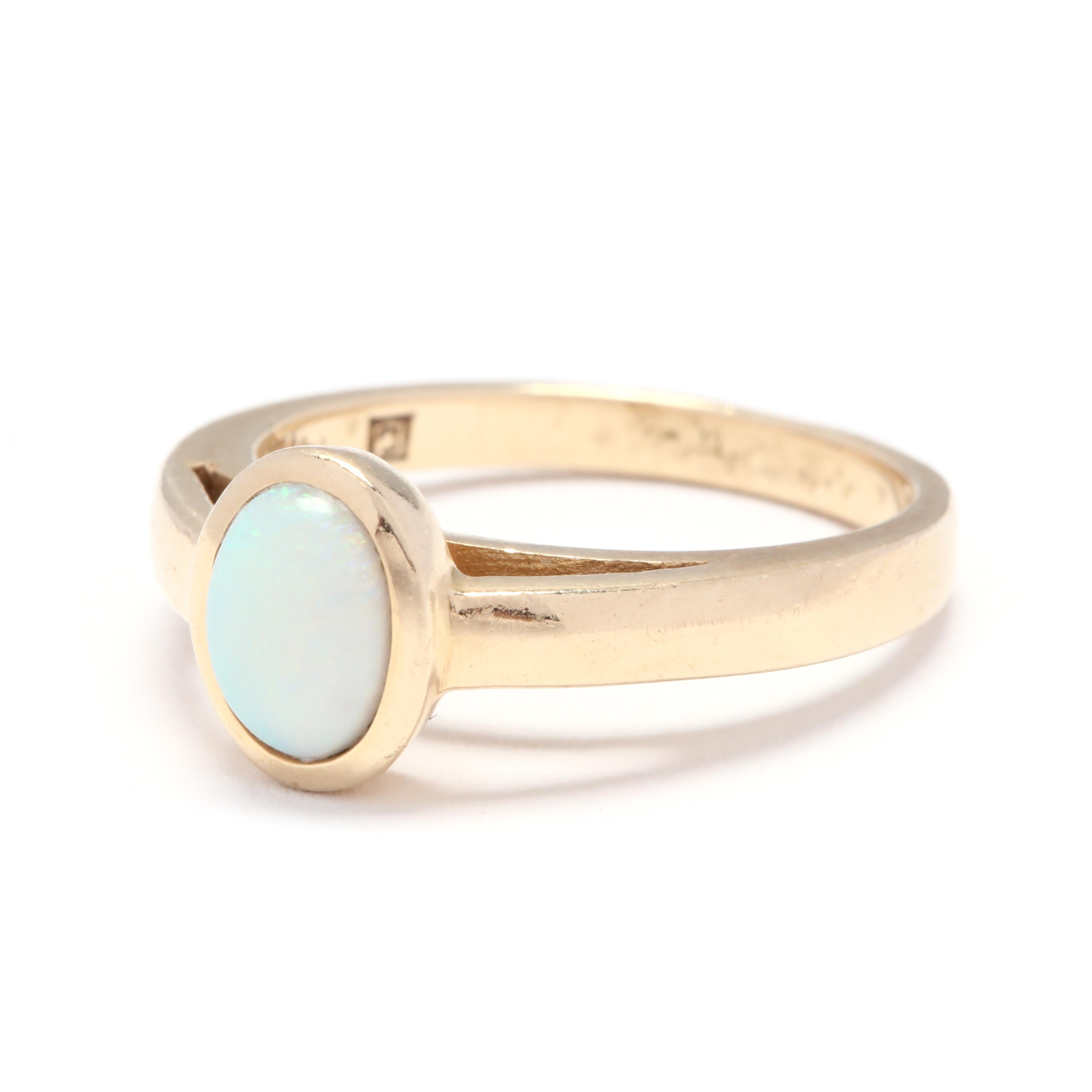 14 Karat Yellow Gold and Opal Solitaire Bezel Ring In Good Condition In McLeansville, NC