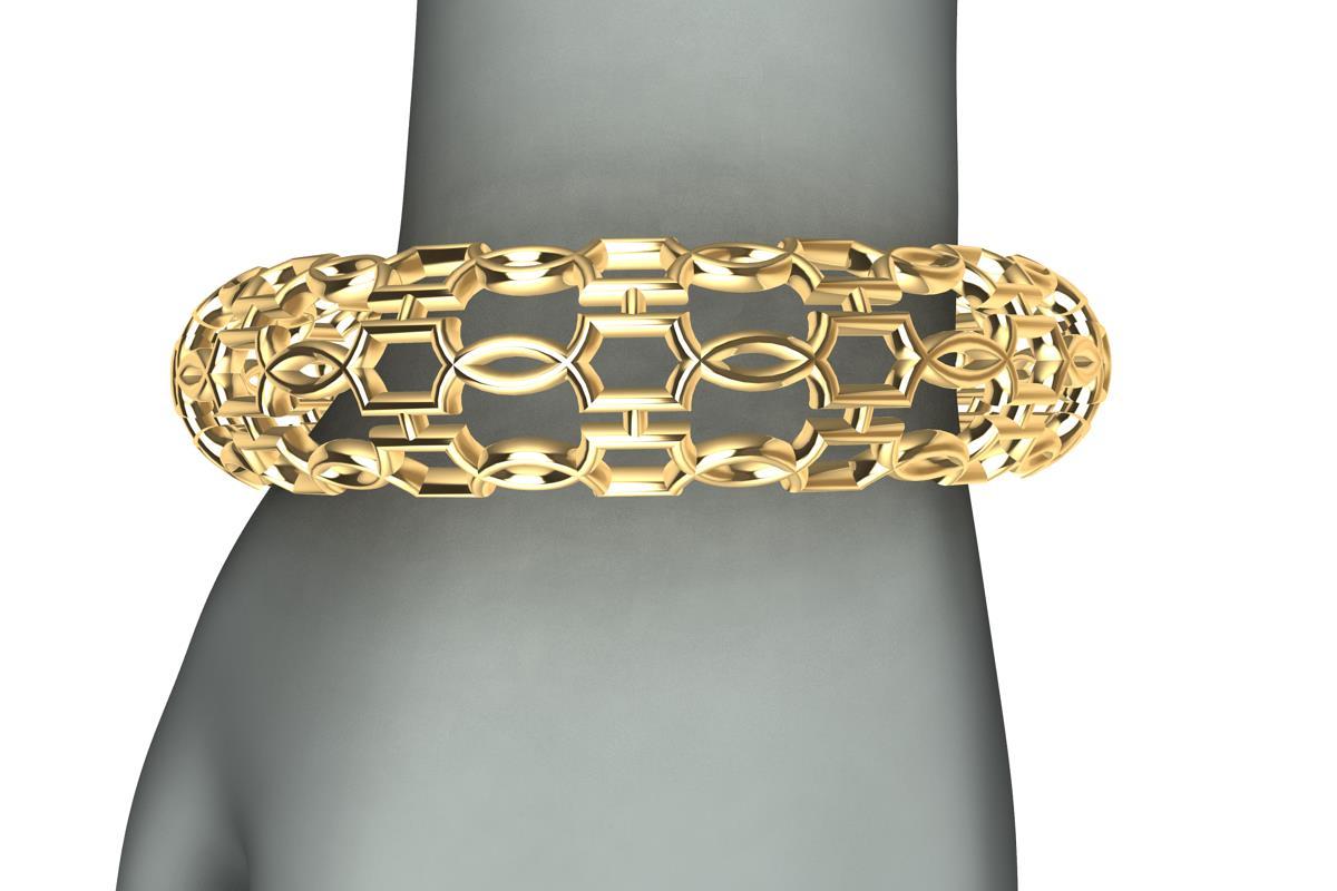 bracelet en or jaune 14K avec cercles ouverts, de la série Gates. Ils s'inspirent des éléments de ferronnerie des portes et fenêtres de l'Europe d'autrefois. Un laçage complexe et un tissage de formes et de cercles pour une combinaison excitante. 