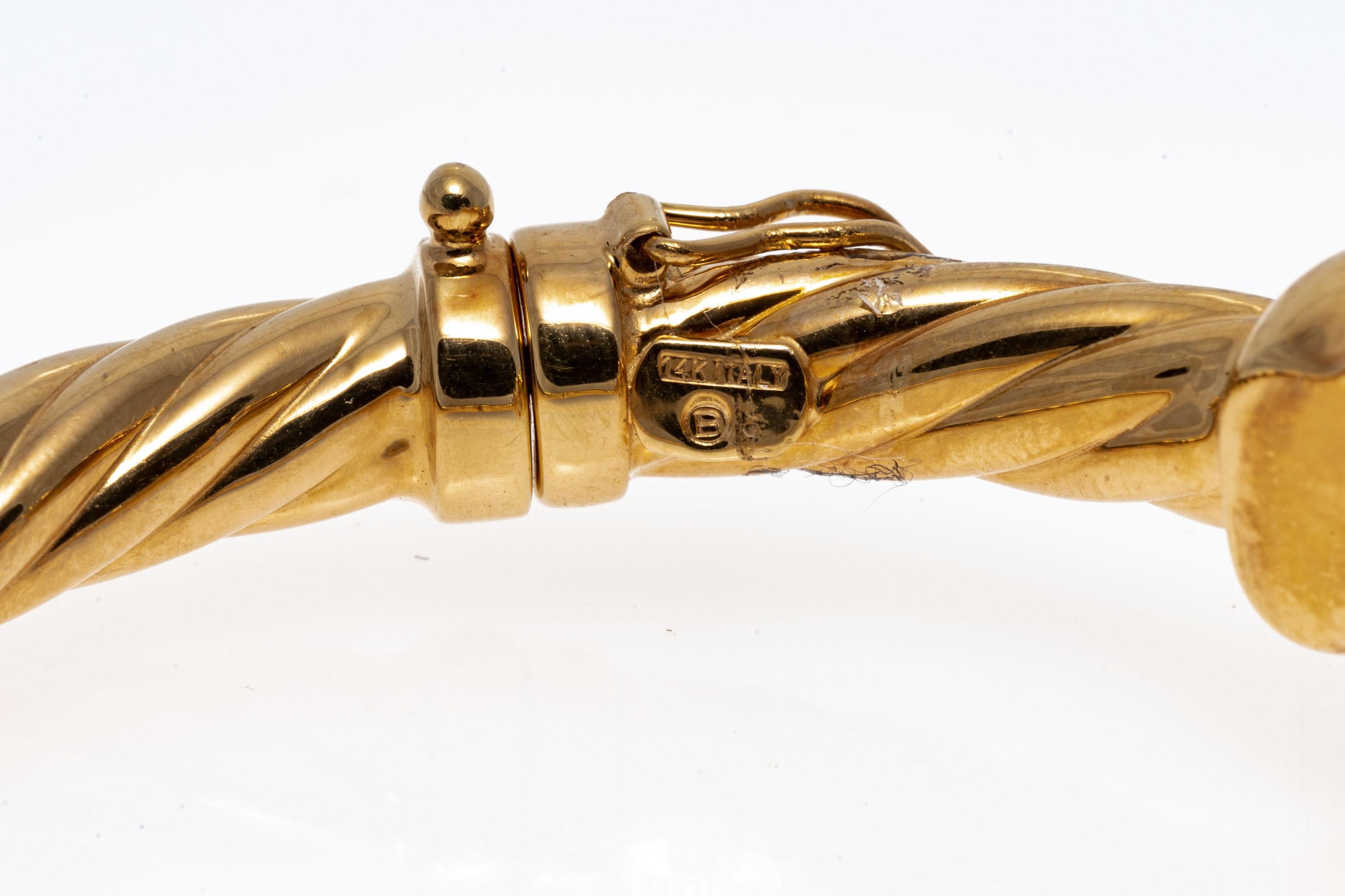 Bracelet jonc à charnières en or jaune 14 carats représentant une panthère opposée et une bague torsadée en vente 1