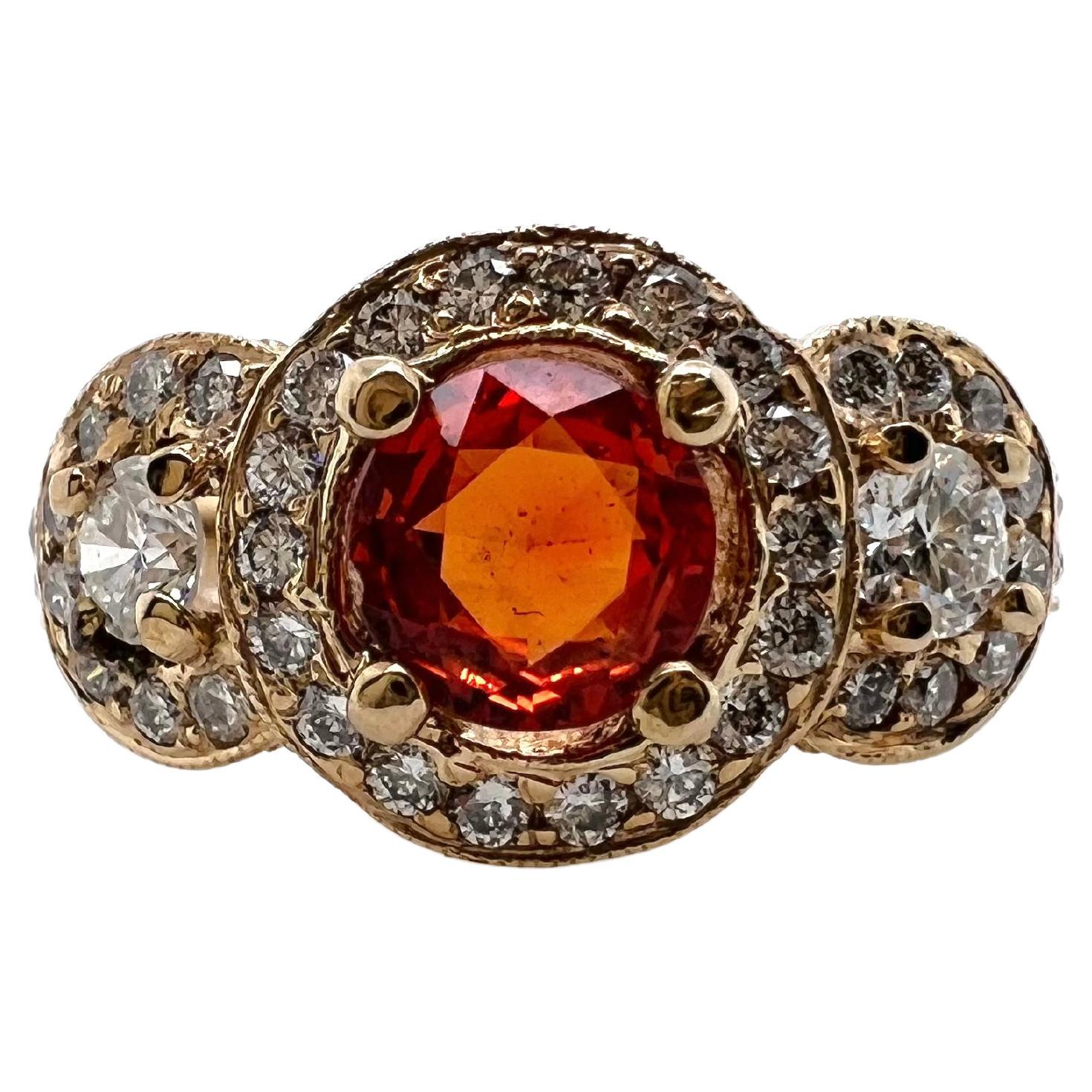 Bague en or jaune 14 carats avec saphir orange et diamants en vente