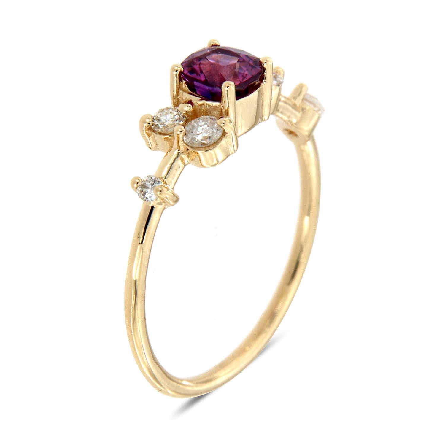 This petite ring features five (5) round brilliant diamonds scattered on top of a delicate 1.2 mm band. In the center of the ring is 0.58 Carat rare natural Vivid Purplish Pink ( Bubblegum) Sapphire. Experience the difference in person!

Product