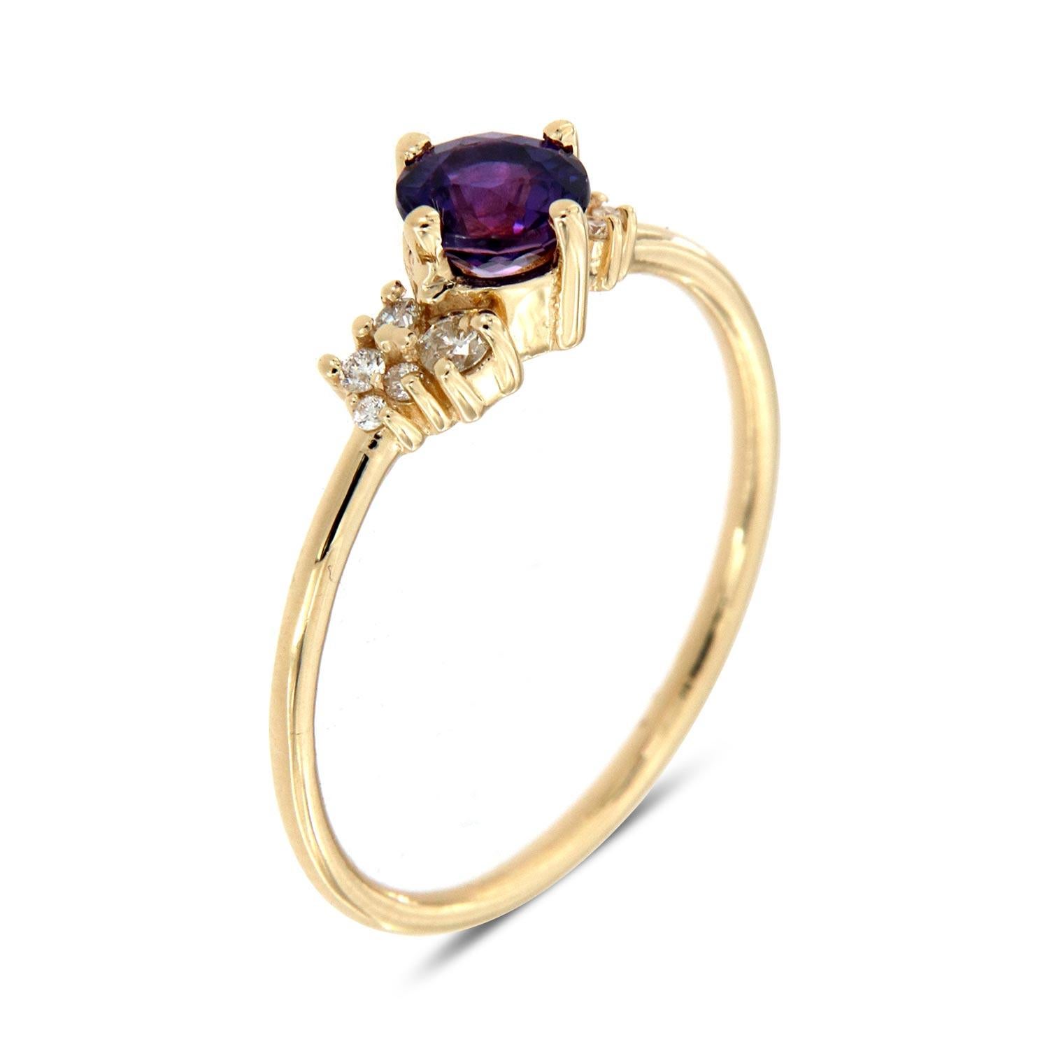 This delicate ring features five(6) round diamonds scattered on top of a 1.2 mm band. The Center Gemstone is a 0.58 Carat Round Natural Purple Sapphire from Sri-Lank set in tiny prongs that enhance this ring's organic and earthy look. Experience the