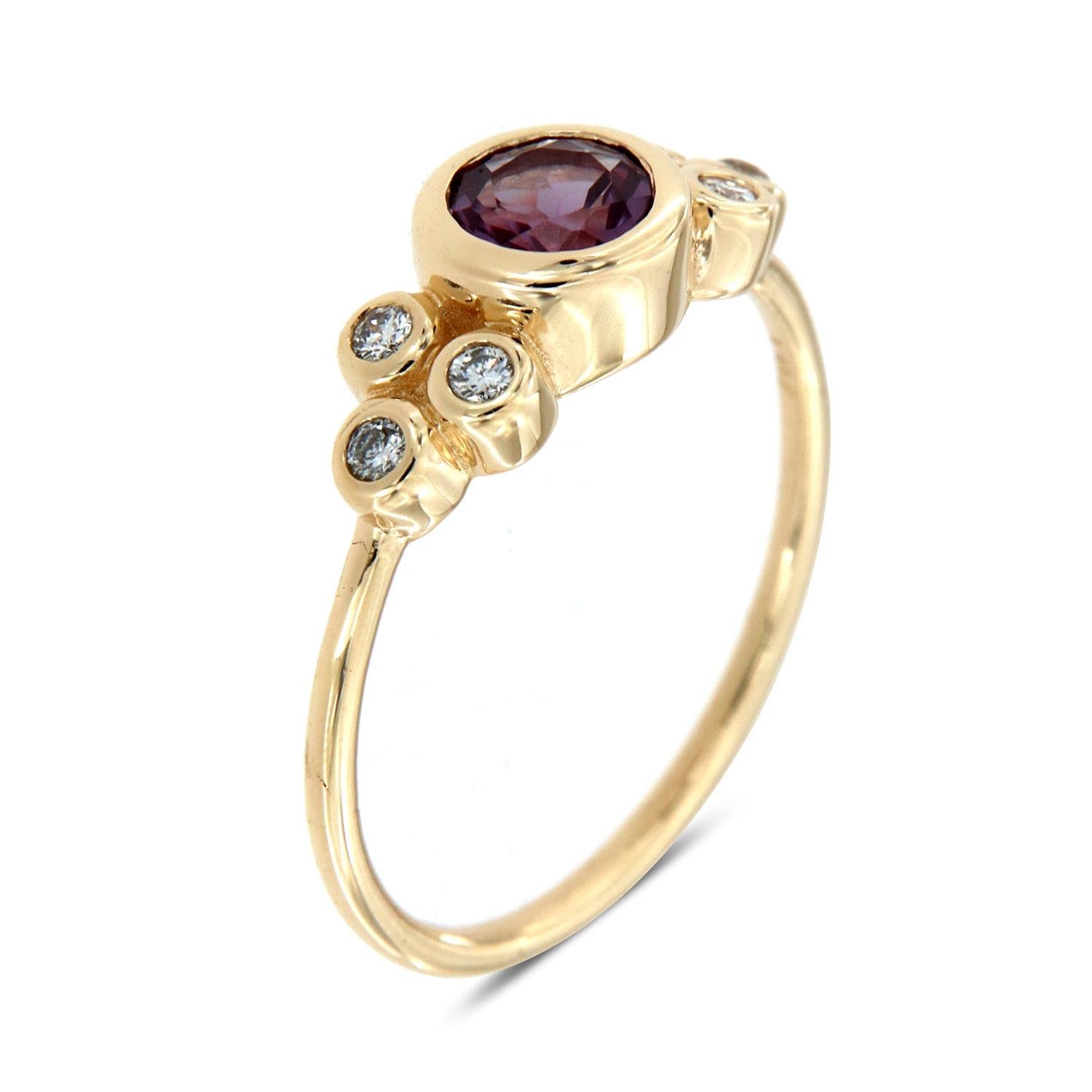 This Delicate ring features six (6) round brilliant diamonds in a thin bezel set on top of a 1.20 mm band. The center Gemstone is 0.59 Carat Round Natural Purple Sapphire from Sri-Lanka. It's stackable & it's fun! Experience the difference in