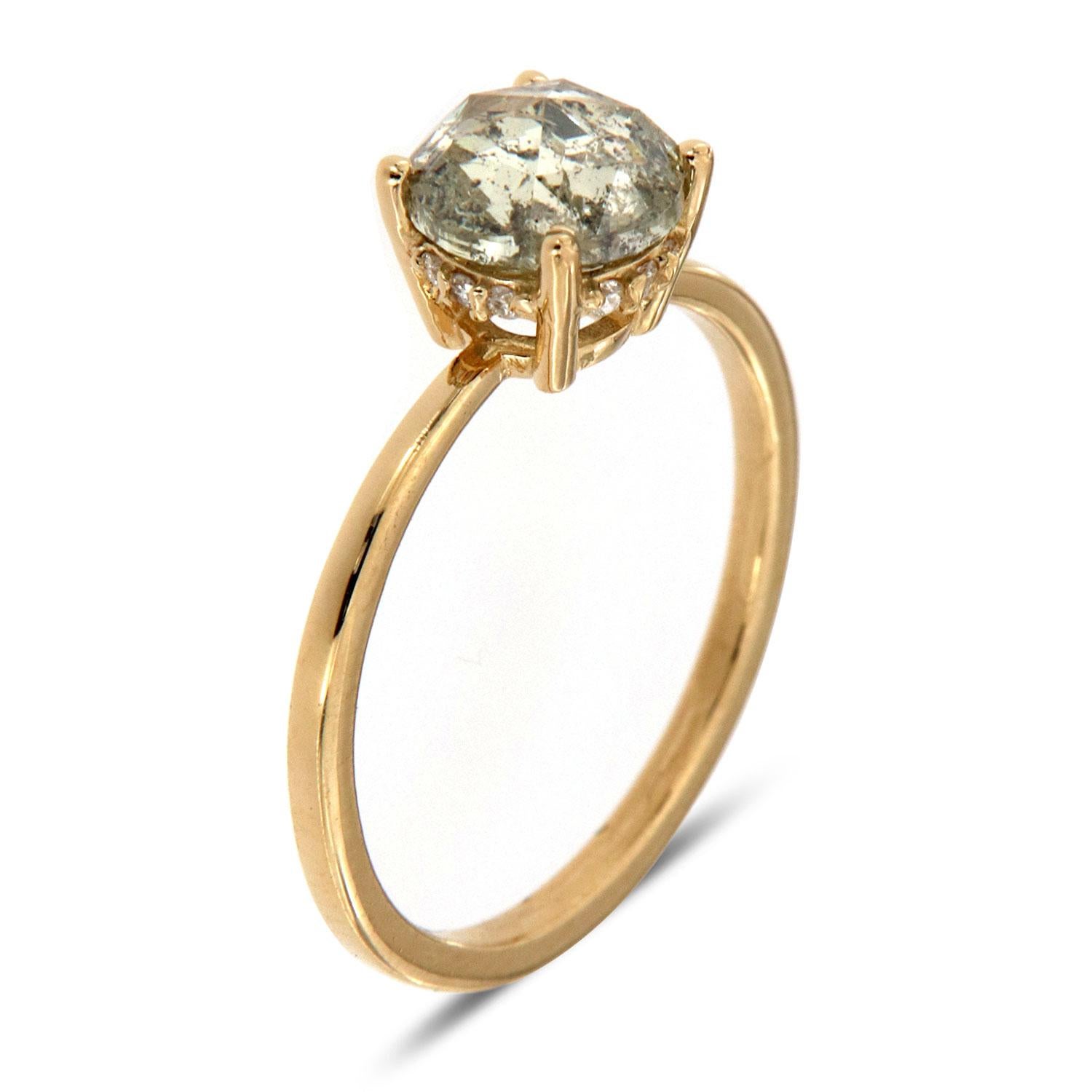 This Delicate design features a row of twelve (12) round diamonds micro-prong set in a hidden halo on its crown gallery. In the center of the ring is set 1.28 Carat Salt and Pepper round diamond. If you are looking for a rustic, earthy-designed