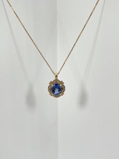 14K Yellow Gold Oval 2.20 Carat Tanzanite and Diamond Pendant Necklace