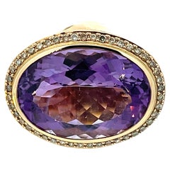 14K Yellow Gold Oval Amethyst & Diamond Halo Ring