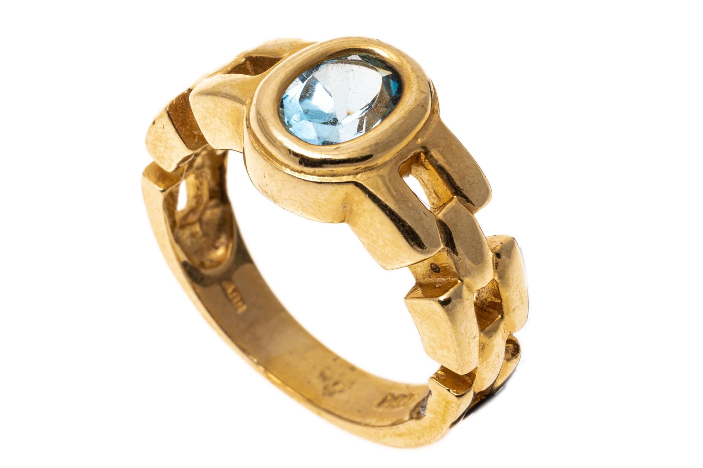 14k Yellow Gold Oval Blue Topaz and Chain Motif Ring, App. 1.01 CTS For Sale 1