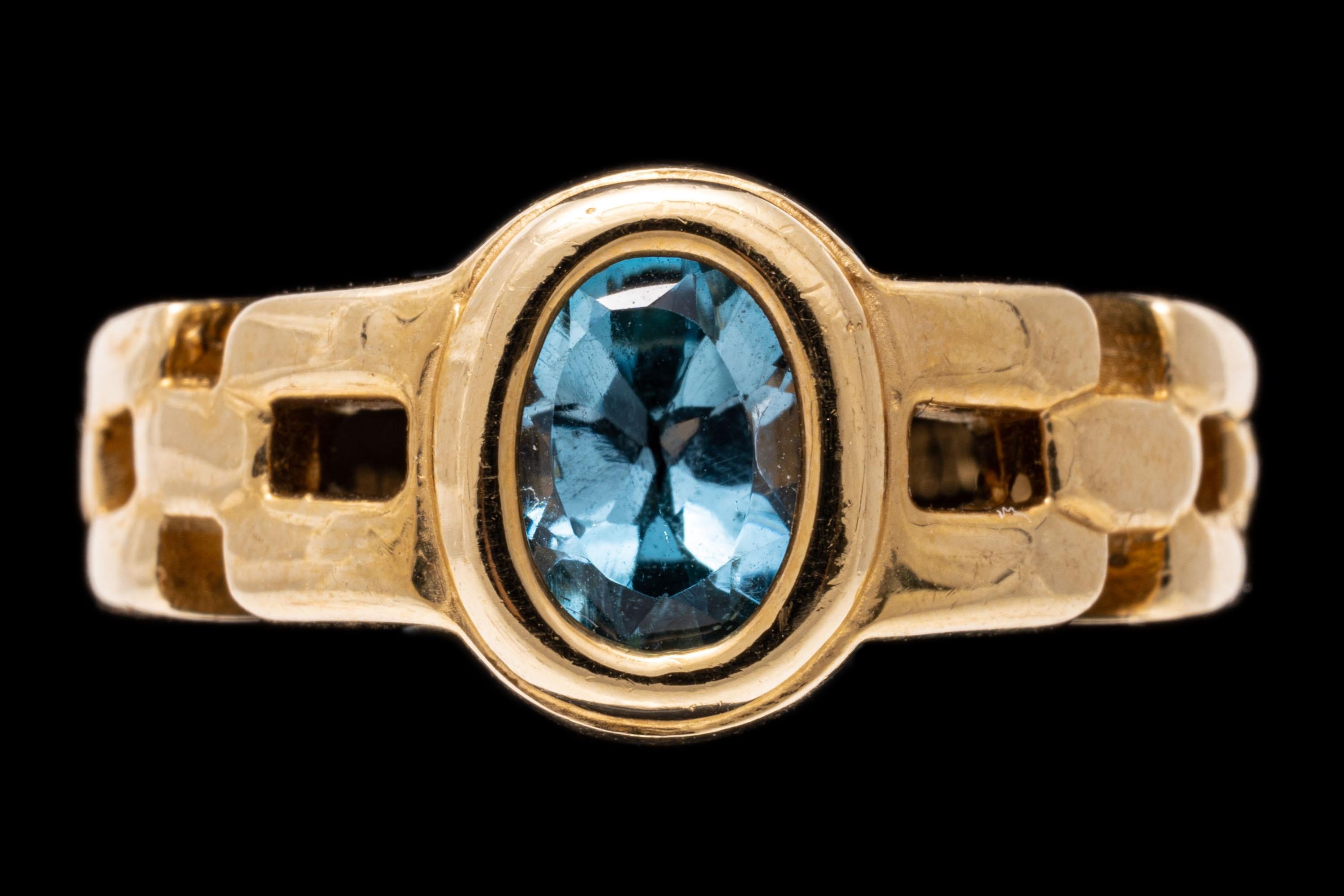 14k Yellow Gold Oval Blue Topaz and Chain Motif Ring, App. 1.01 CTS For Sale 3