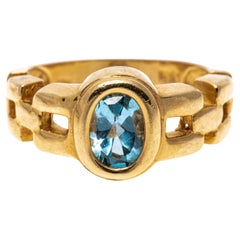 14k Yellow Gold Oval Blue Topaz and Chain Motif Ring, App. 1.01 CTS