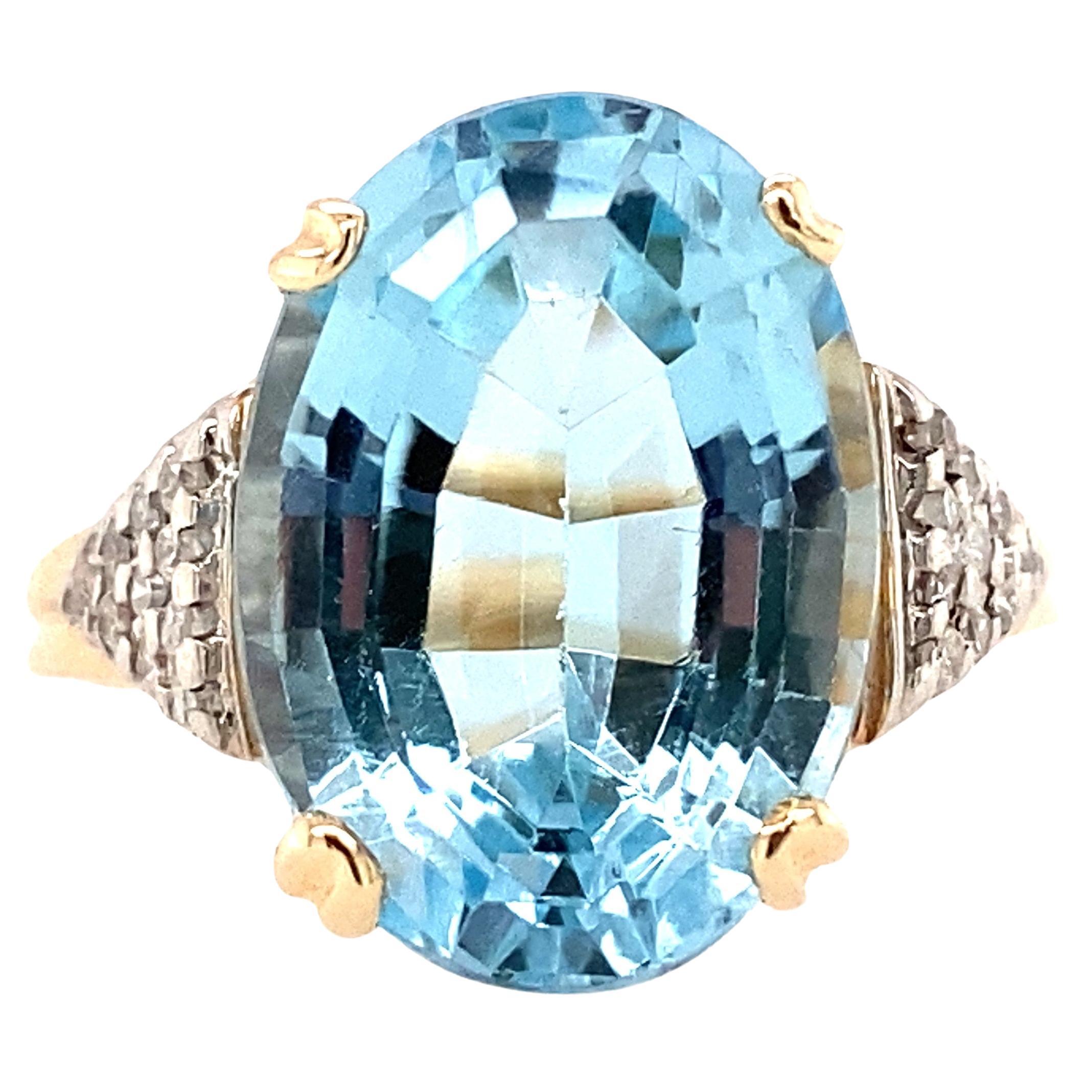 14K Yellow Gold Oval Blue Topaz and Diamond Ring