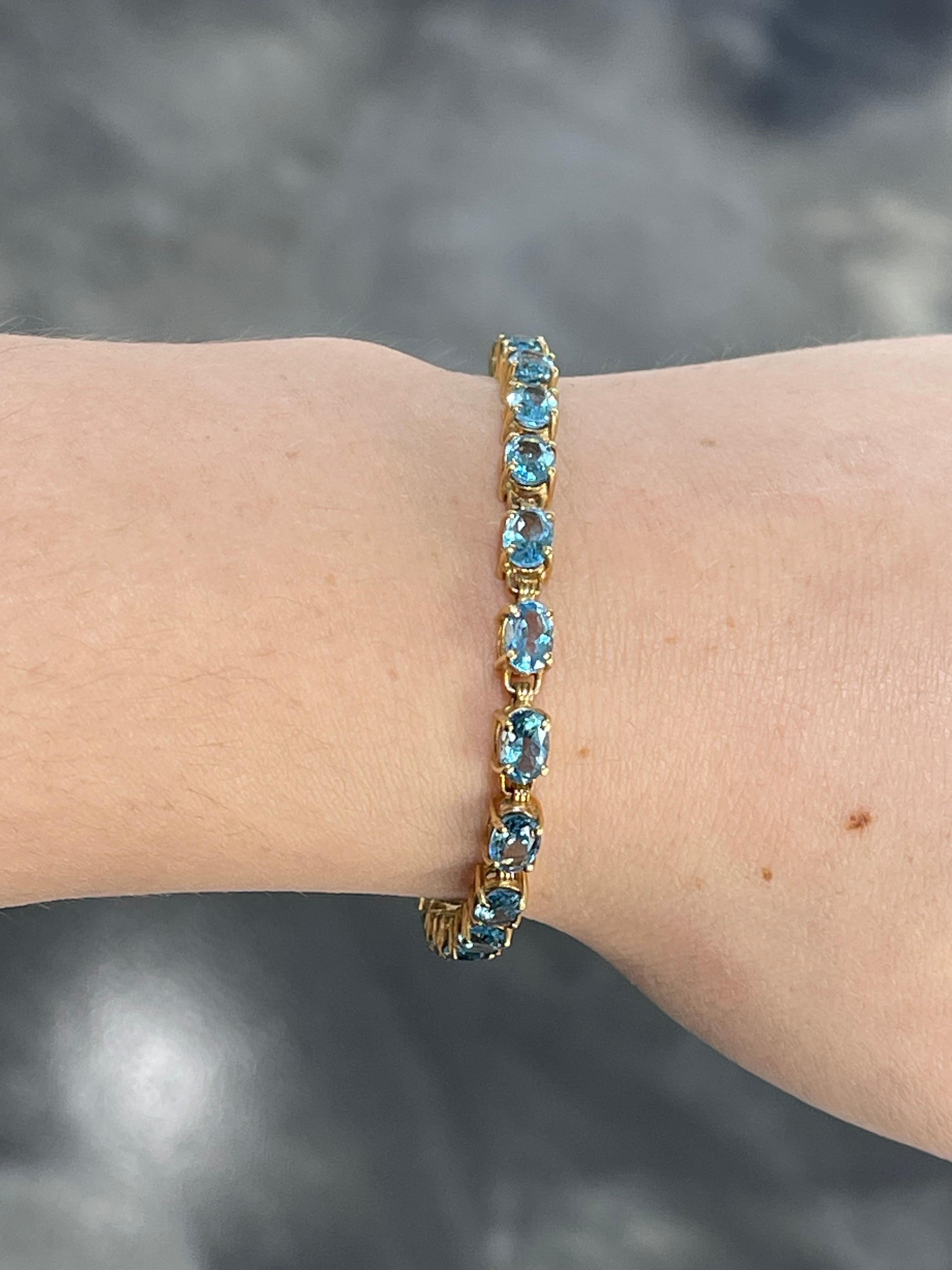 Women's 14K Yellow Gold Oval Blue Topaz Bracelet For Sale