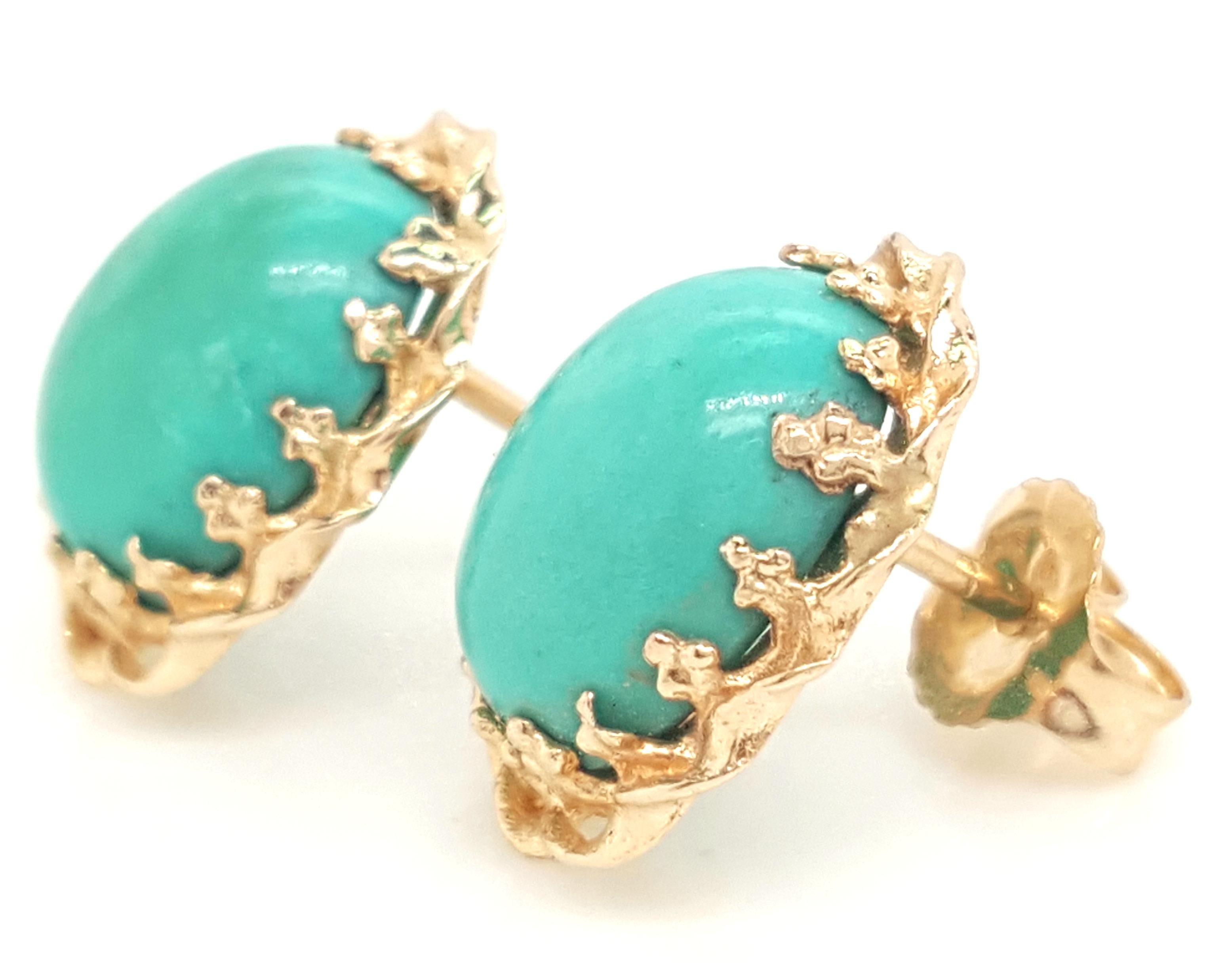 14 Karat Yellow Gold Oval Cabochon Howlite Stud Earrings.  The earrings feature a pair of oval cabochon dyed howlite.  The howlite are each set into a 14 karat yellow gold prong settings with a recessed bezel, completed by posts.  Earrings weigh