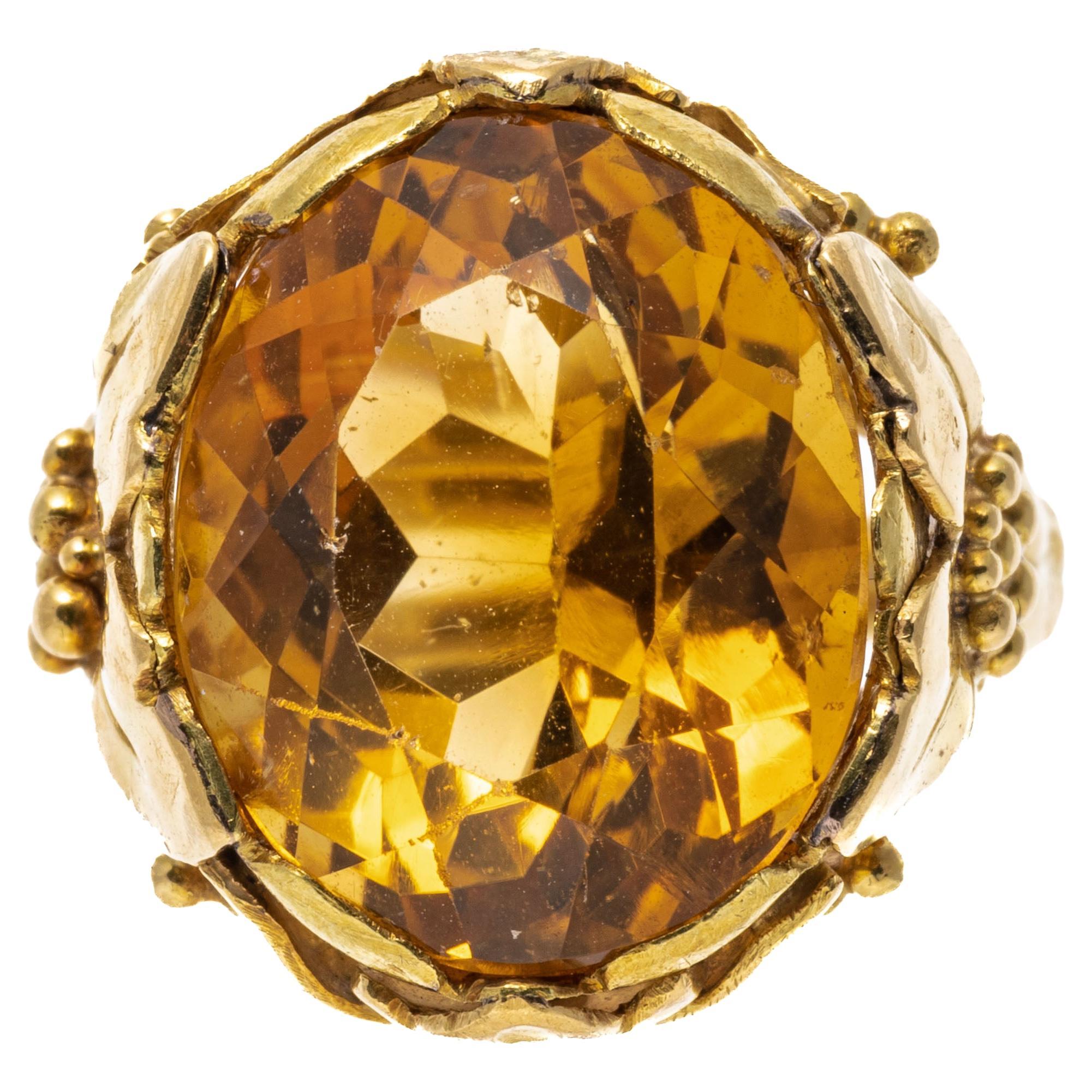 14k Yellow Gold Oval Citrine 'App. 8.84 Cts' and Flower Form Ring For Sale