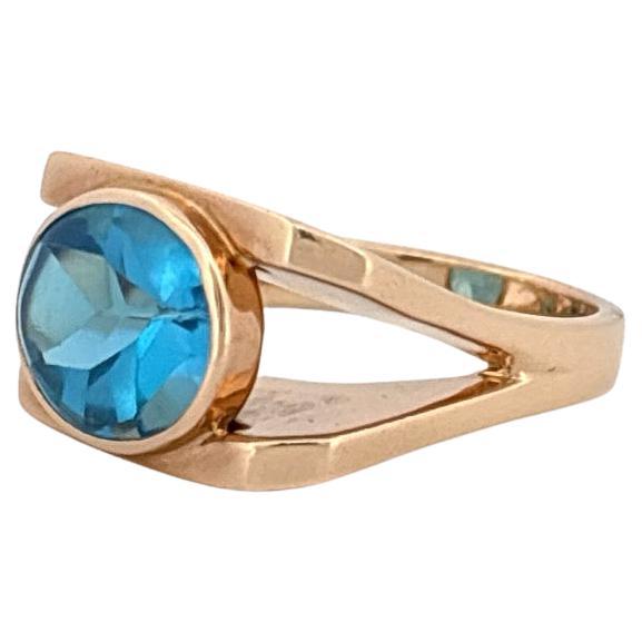 Anello in oro giallo 14K con taglio ovale e 4,50 carati di topazio blu svizzero