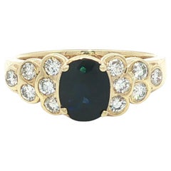 14k Yellow Gold Oval Deep Royal Blue Sapphire Bezel Diamond Step Sides Ring