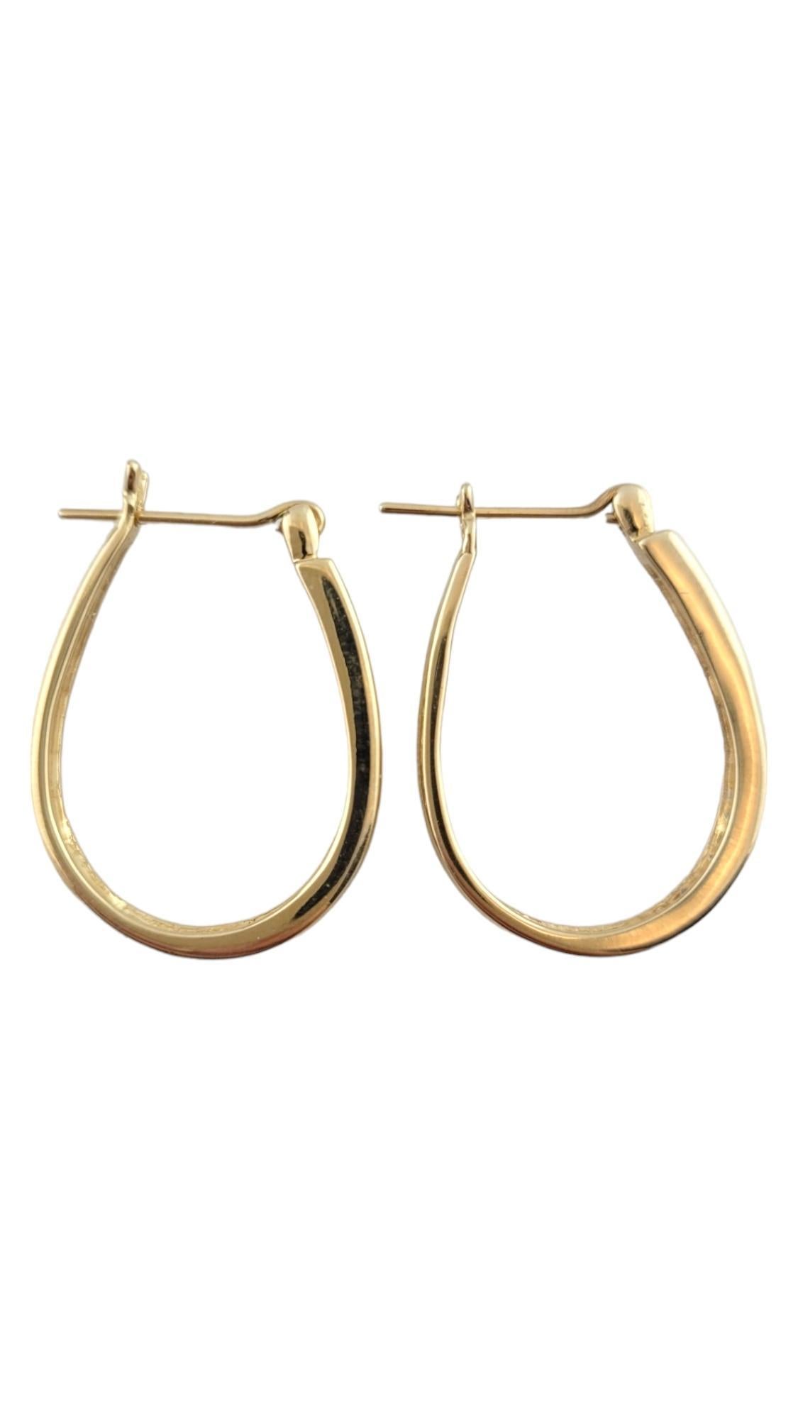 Vintage 14K Yellow Gold Oval Diamond Hoops

This gorgeous set of oval hoop earrings are crafted form 14K yellow gold and have 16 sparkling round brilliant cut diamonds!

Approximate total diamond weight: .80 cts

Diamond color: I

Diamond clarity: