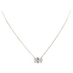 14k Yellow Gold Oval Diamond pendant weighing 3.00cts.