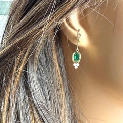 14K Yellow Gold Oval Emerald and Diamond Bezel Set Lever-Back Hoop Earrings