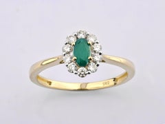 14K Yellow Gold Oval Emerald and Round Diamond Halo Ring