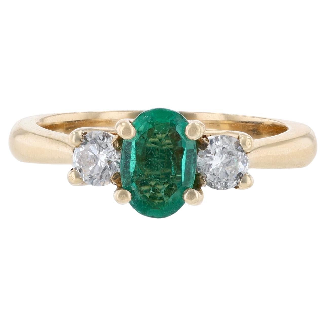 14K Yellow Gold Oval Emerald Round Diamond Ring