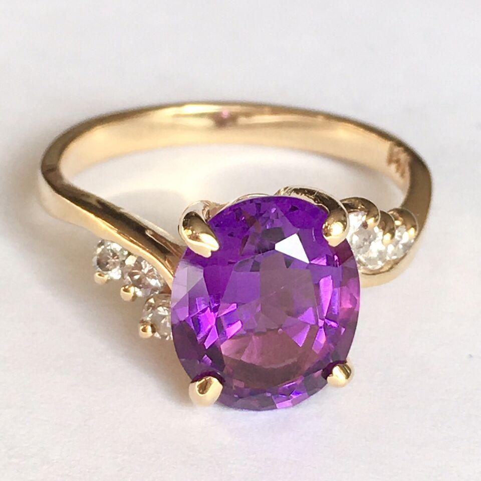 Modern 14k Yellow Gold Oval Faceted Amethyst and Diamond Ring For Sale