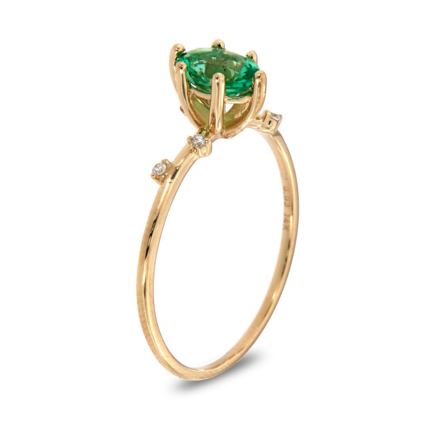 This petite fashion ring is impressive in its vintage appeal, featuring a natural green oval emerald, accented with scattered round brilliant diamonds. Experience the difference in person!

Product details: 

Center Gemstone Type: Emerald
Center