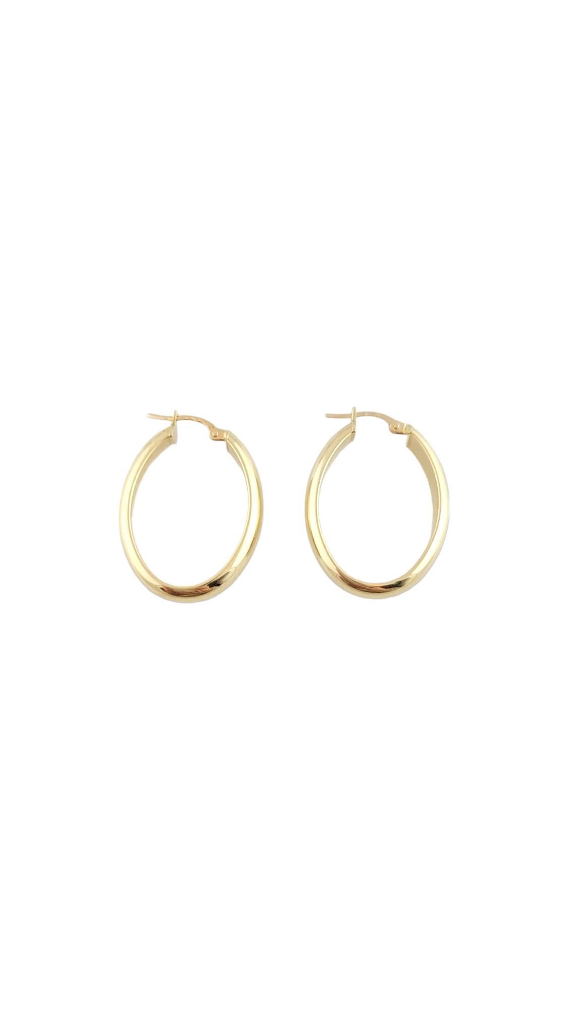 Vintage 14K Yellow Gold Oval Hoop Earrings

Oval hoop earrings in 14K yellow gold details.

Weight: 1.9 dwt./ 2.93 g

Hallmark: Italy 14K Milor

Size: 31 mm X 22.7 mm/1.2 in X 0.9 in

Approximately 5 mm thick.

Very good condition, professionally