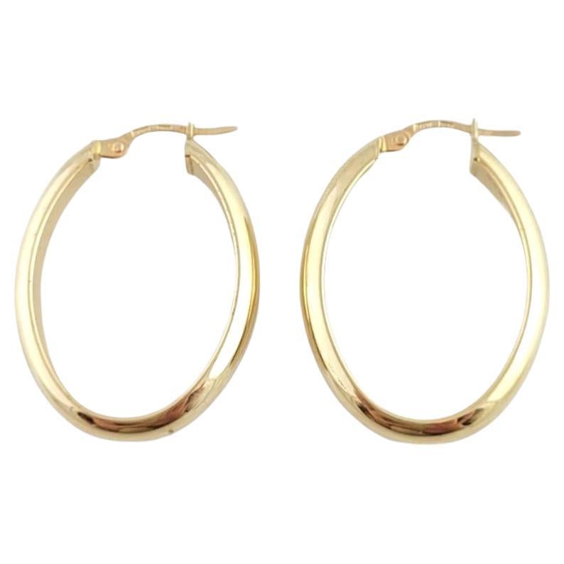 14K Yellow Gold Oval Hoop Earrings #15855