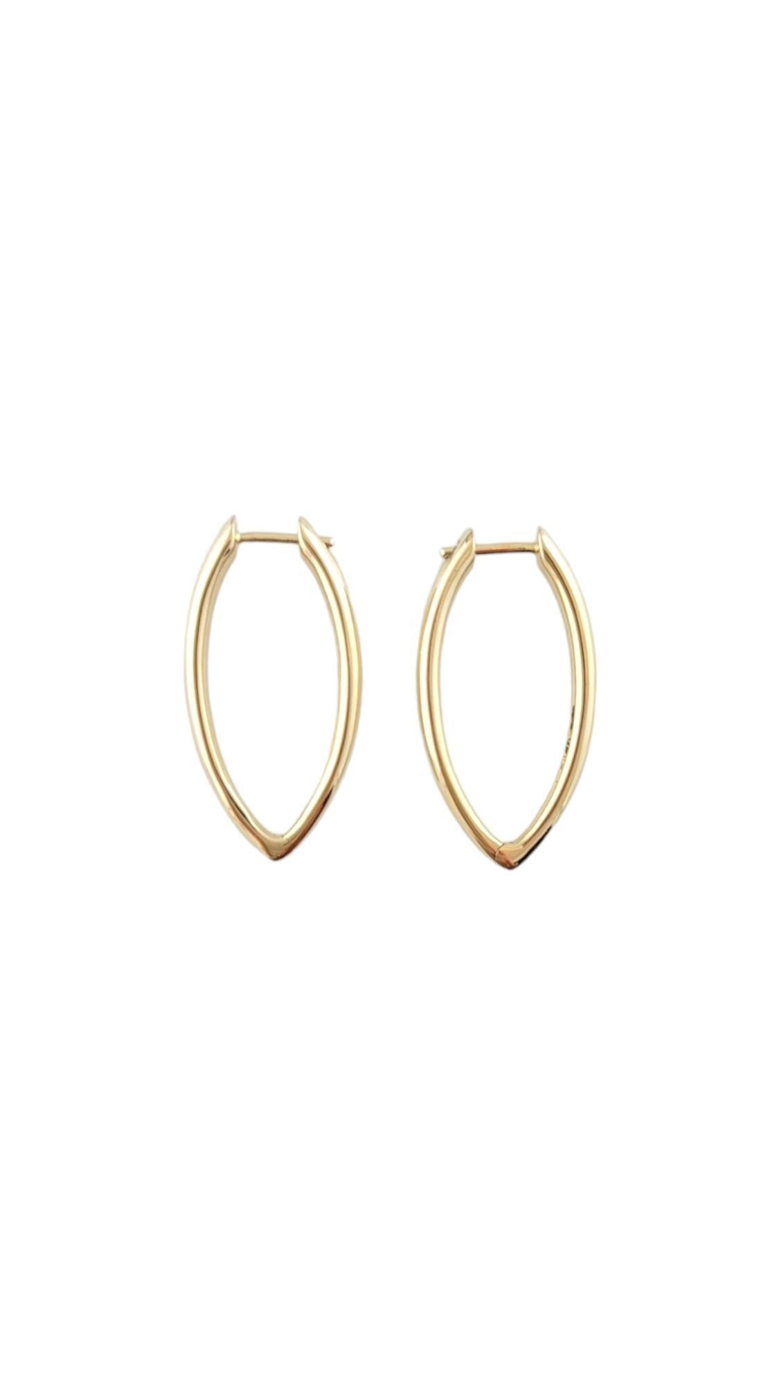 14 Karat Yellow Gold Oval Hoop Earrings-

These unique gold hoops are a gorgeous addition to your collection. 

Size: 26.8 mm x 2.7 mm x 2.0 mm. 

Stamped: 14K  

Weight: 3.2 dwt./ 5.0 gr.

Very good condition, professionally polished.

Will come