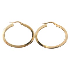 14K Yellow Gold Oval Hoop Earrings #17381