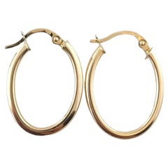 14K Yellow Gold Oval Hoop Earrings #17388