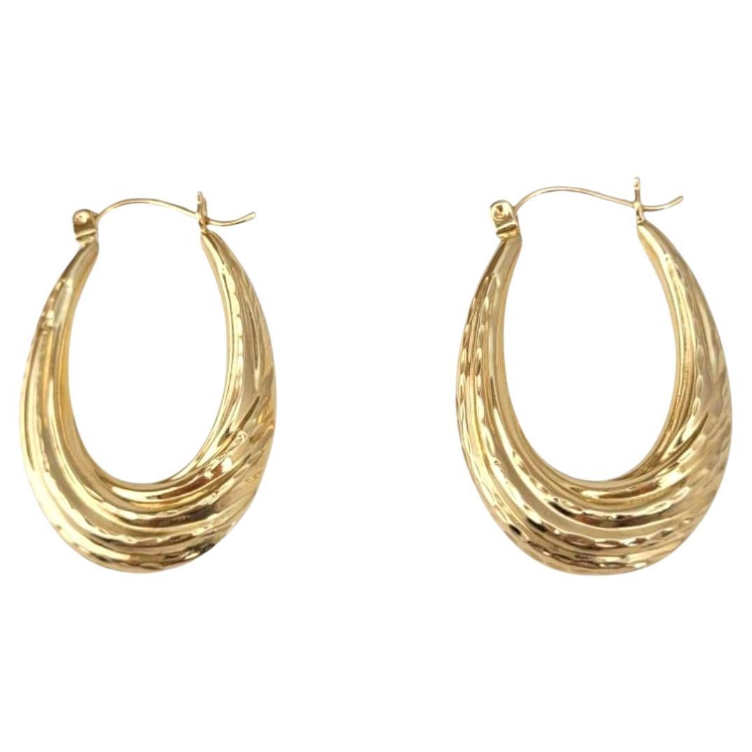 14K Yellow Gold Oval Hoop Earrings #21720