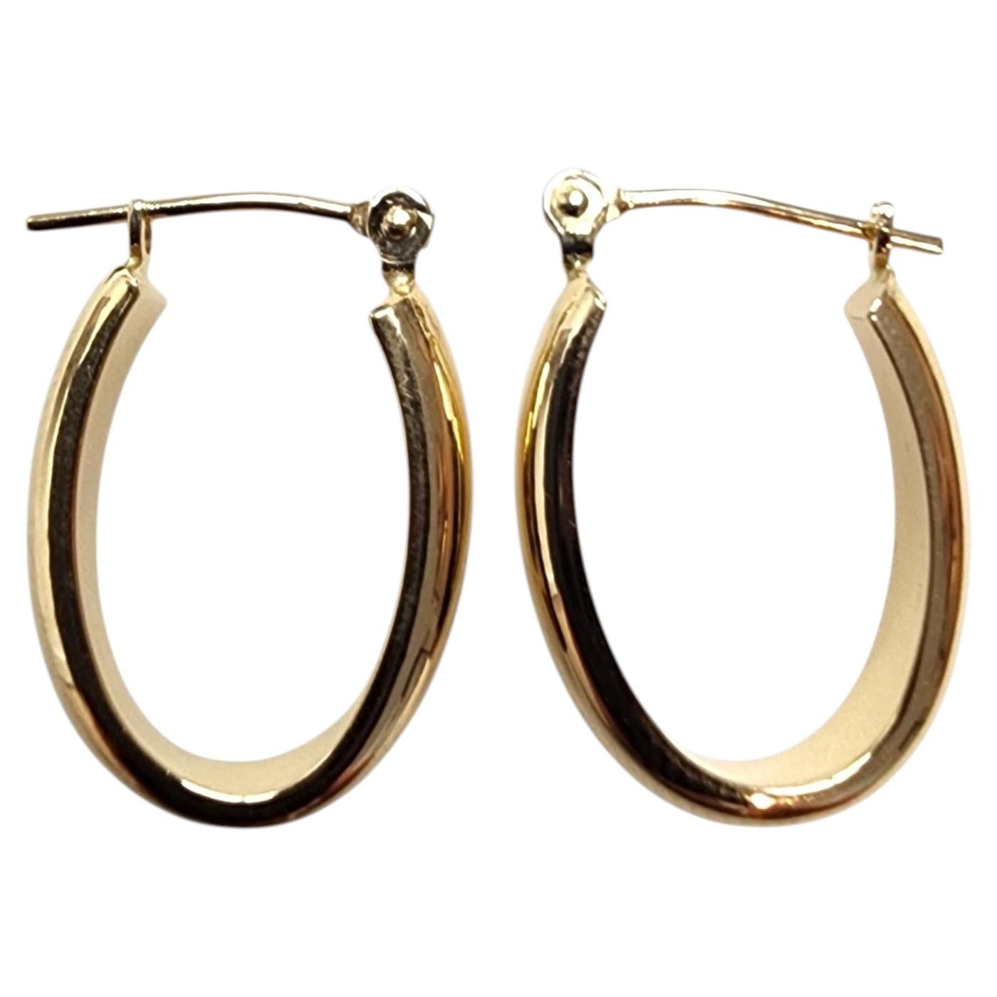 14K Yellow Gold Oval Hoop Earrings #25515