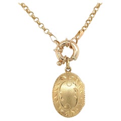 Médaillon ovale avec chaîne lourde décorative en or jaune 14 carats