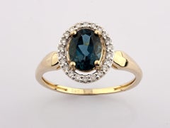 14K Yellow Gold Oval London Blue Topaz and Diamond Halo Ring