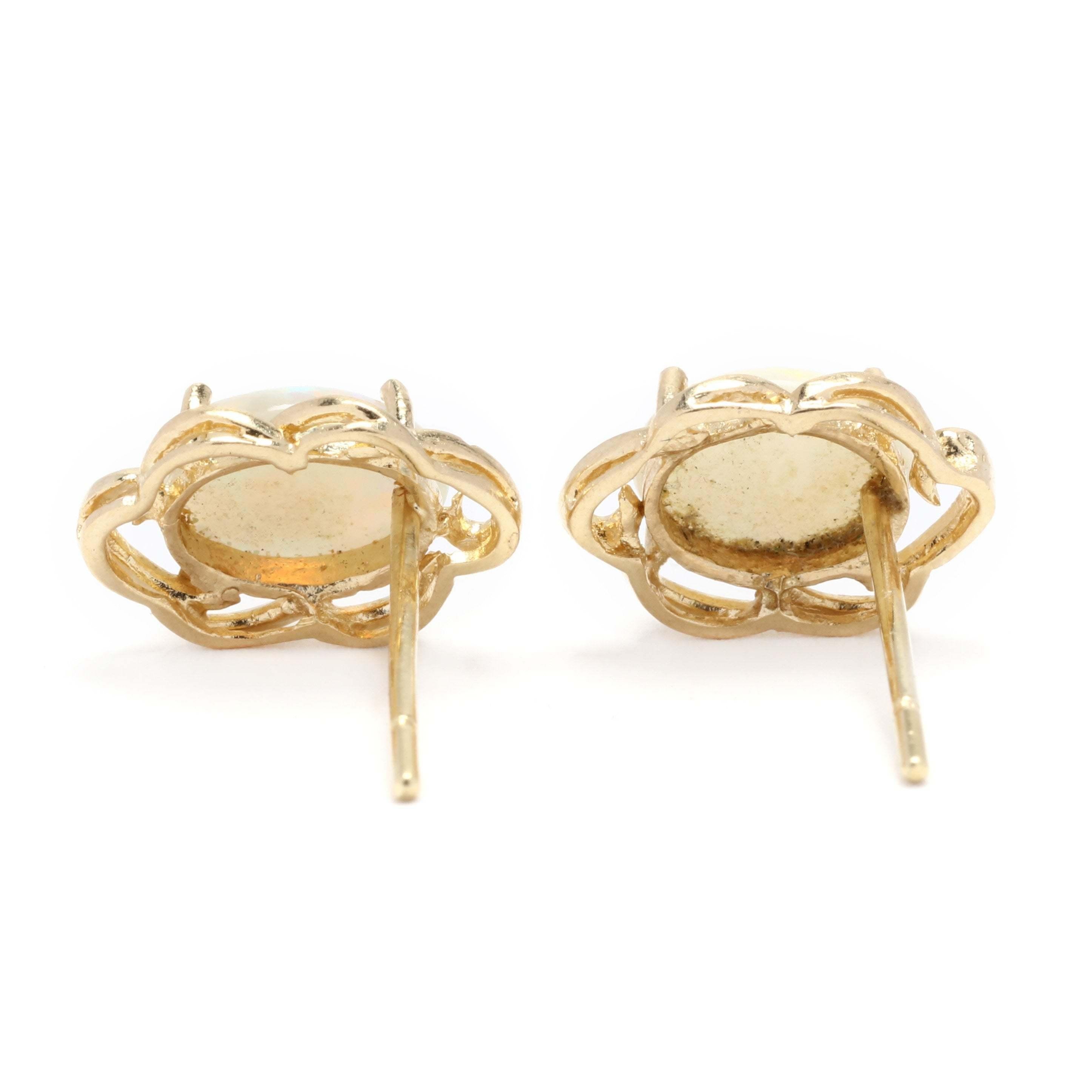 Ovale Opal-Ohrstecker 14 Karat Gelbgold mit Wellenschliff (Ovalschliff)