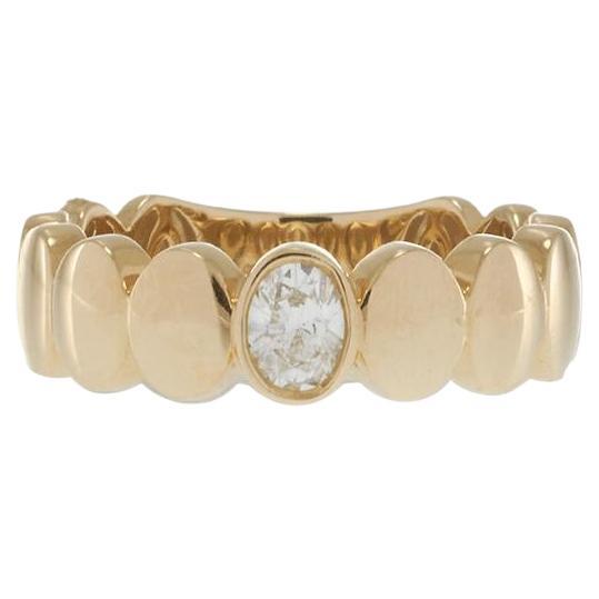 14K Yellow Gold Oval Pattern Ring with Oval Cut Diamond